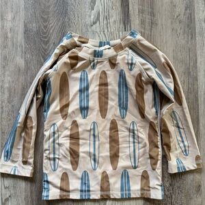 Kate Quinn Blue and Brown swim rash guard Shirt